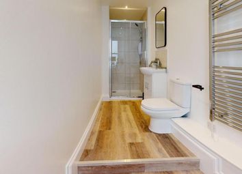 A Modern And Clean Bathroom Featuring A Spacious l...