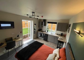 Bright And Modern Master Bedroom Featuring A Comfo...