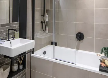 Heron Wharf, Property B1-03-03, Spacious Bathroom With A Dark Design