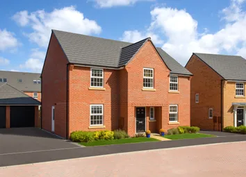Outside View Of Detached Home With A Double Garage And Parking For Four Cars