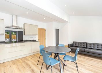 Bright And Modern Living Room Featuring A Sleek Op...