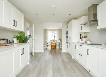 The Kitchen Leads Through To The Dining Area, Perfect For Family Mealtimes