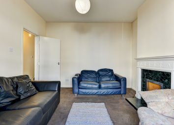 A Spacious And Well-Maintained Living Room Featuri...