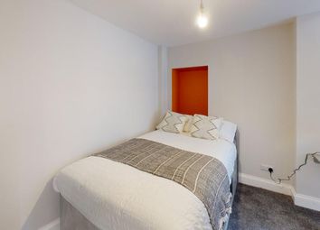 A Cozy And Inviting Double Bedroom With Tasteful d...