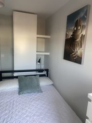 A Cozy And Inviting Double Bedroom Featuring Moder...