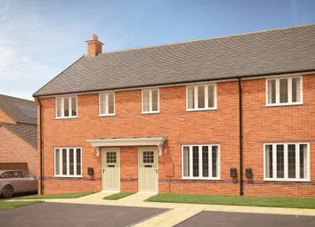 A Row Of Modern Brick Townhouses With Light Green Doors Stands In The Foreground