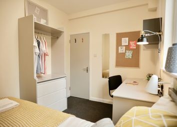 Bright And Inviting Student Bedroom Featuring A Co...