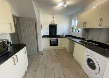 A Clean And Bright Kitchen With Modern Appliances ...
