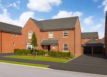 Outside View Of Detached Home With Double Garage And Driveway