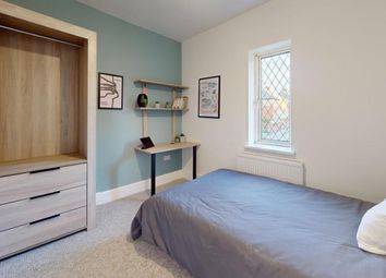 A Bright And Tidy Double Bedroom Featuring A Fitte...