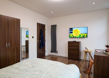 A Spacious And Well-Maintained Bedroom Featuring A...