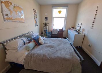 A Spacious Master Bedroom Featuring A Double Bed W...