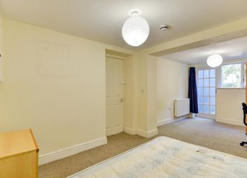 A Bright And Welcoming Living Room With Natural li...