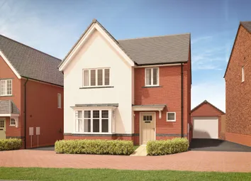 A Modern Two-Story House With Red Brick And White Stucco Is Fronted By A Neatly Trimmed Hedge And A