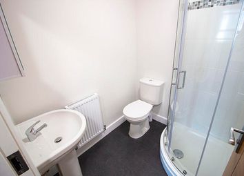 This Modern Bathroom Features A Spacious Shower An...