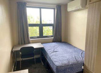 This Inviting Double Bedroom Features A Comfortabl...
