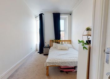 Cozy Double Bedroom Featuring A Comfortable Bed, A...