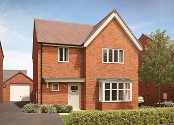 A Modern Brick House With A Bay Window And A Garage Sits In The Foreground