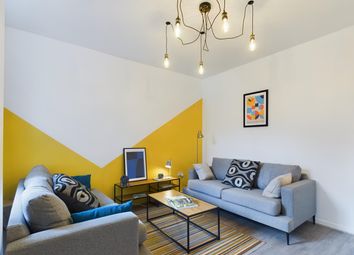 Bright And Inviting Living Room Featuring Stylish ...