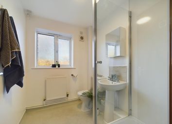 A Bright And Clean Bathroom Featuring Modern Fixtu...