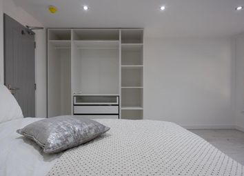 Spacious Master Bedroom Featuring A Comfortable Be...