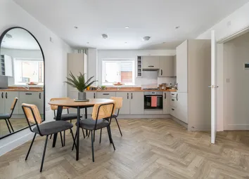 An Open Plan Kitchen-Dining Area