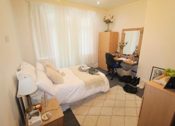 A Bright And Welcoming Master Bedroom Featuring A ...