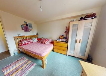 A Bright And Airy Double Bedroom Featuring A Comfo...