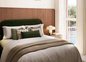 CGI Of Double Bed, Bedside Tables And Wall Hanging, Armchair And Window Overlooking Body Of Water