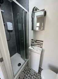 Bright And Modern Bathroom Featuring A Sleek Glass...