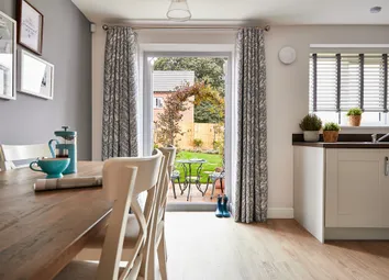 A Welcoming Hub For Family Life, With French Doors Leading Straight Into The Garden