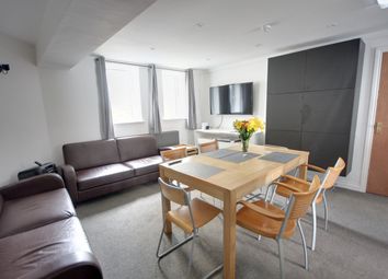 A Spacious And Stylish Living Room Perfect For Soc...