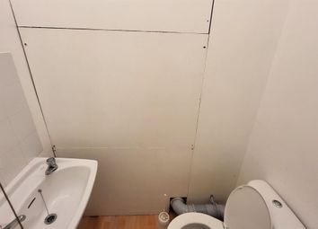 Compact And Clean Single Toilet Featuring A White ...