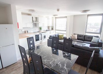 A Spacious And Modern Living Room Featuring A Styl...