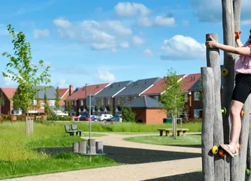 Image Of Children Playing At A Playground At Highcroft