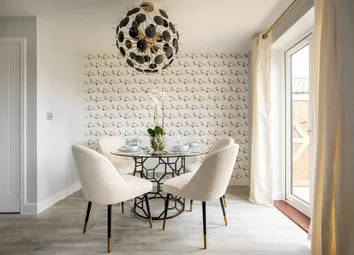 A Light And Airy Dining Area Leading Out To The Garden