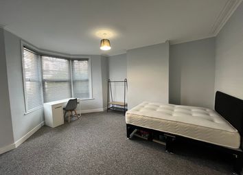 A Spacious And Bright Double Bedroom Featuring A c...