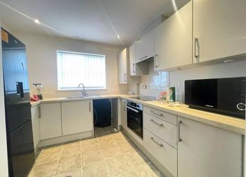 This Modern Kitchen Boasts Ample Counter Space And...