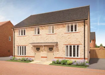 A Pair Of Modern Semi-Detached Houses With Light Brickwork And Light-Colored Doors Stand In The Fore