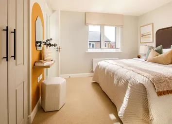 An Impressive Main Bedroom With Plenty Of Storage Space