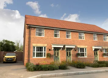 A Row Of Modern, Brick-Built Townhouses With Red Tile Roofs