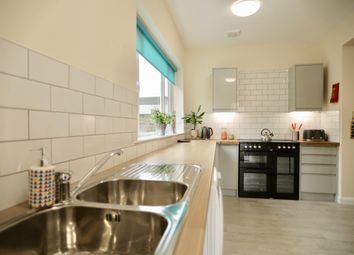 Bright And Modern Kitchen With A Clean Countertop,...