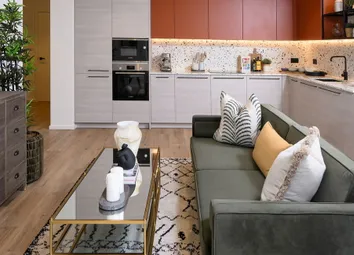 Living Space In Foreground, Kitchen, Dining Table And Balcony Doors In Background.