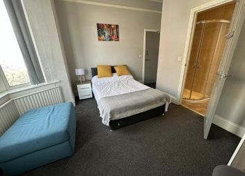 Bright And Inviting Master Bedroom Featuring A Com...