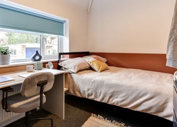 This Inviting Double Bedroom Features A Cozy Layou...