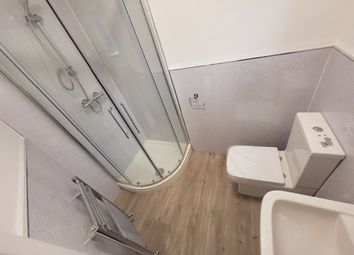 This Modern Bathroom Features A Spacious Shower, S...