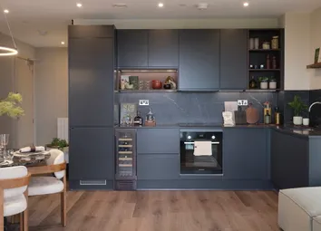 Living Space And Dining Table With Halo Light Above In Foreground, Kitchen (Navy Blue Design) With