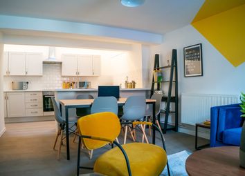 A Bright And Spacious Modern Living Room Featuring...