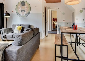 This Contemporary Living Room Features Stylish Dec...