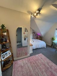 Bright And Spacious Master Bedroom With A Comforta...